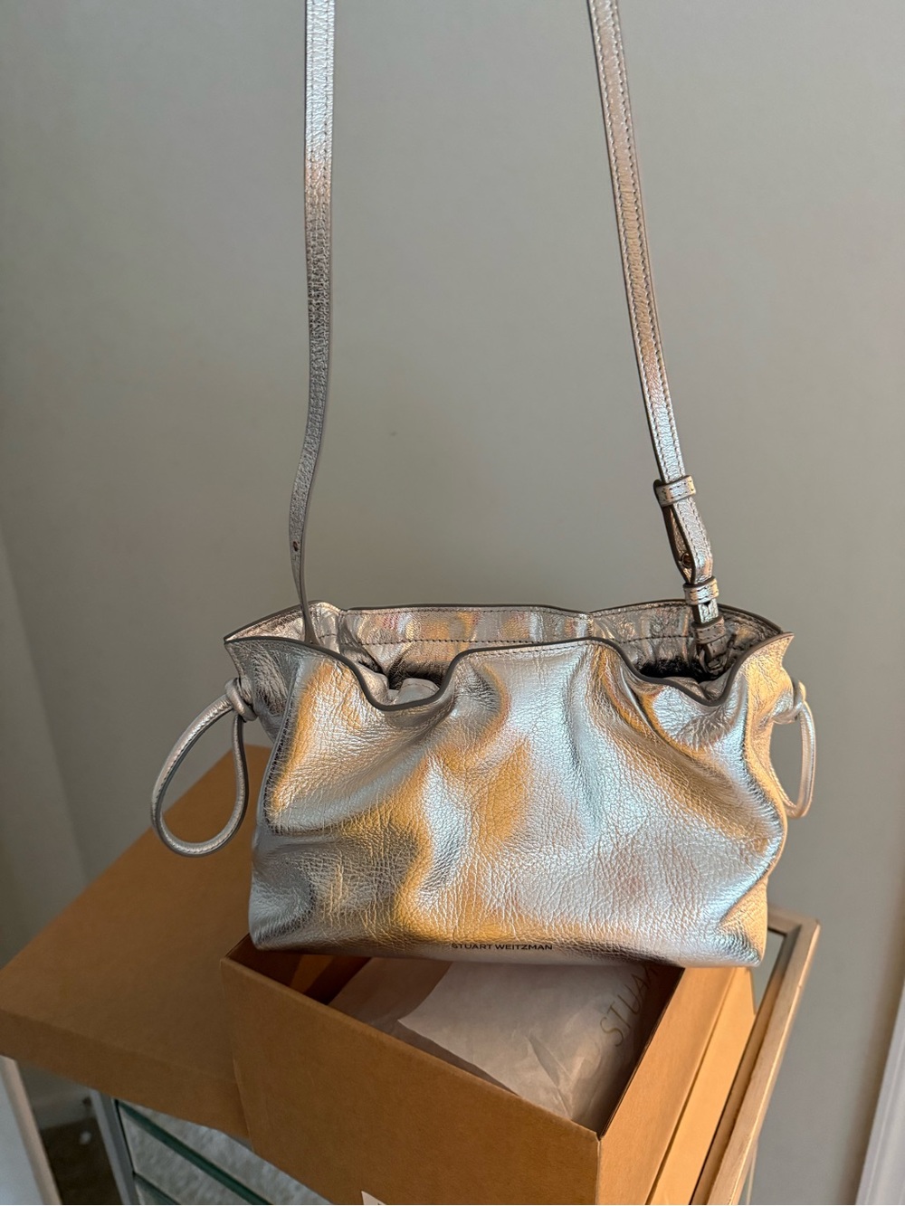 Stuart Weitzman Metallic Silver Drawstring Crossbody Bag